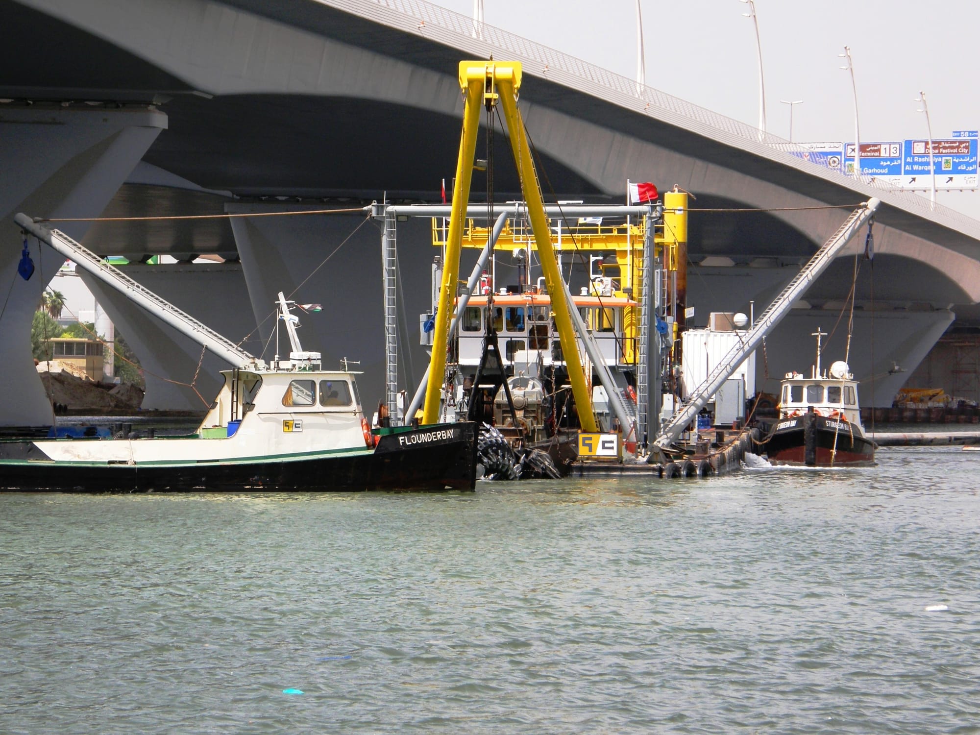 Stacked dredge pipeline sections seen end-on.